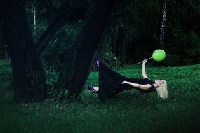 girl during levitation in the forest
