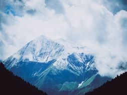 gorgeous Mountain peak among clouds