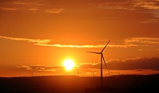 golden Sunrise and wind wheel scene