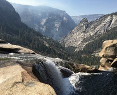 scenic foamy Waterfall in Rocky Mountains