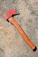 ax with a long wooden handle