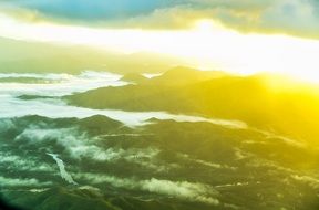 Aerial view of cloudy sky and mountains