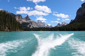 landscape of the trail from a motor boat on a lake
