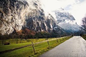 road along the rocks in the fog