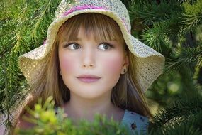 photo of a girl in a knitted panama