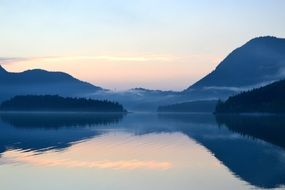 beautiful calm mirror lake On the Sunset