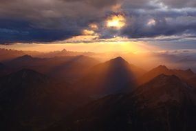 sun rays through clouds over Zugspitze, Bavaria