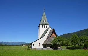 Landscape with the wedding church on the meadow