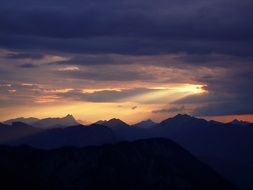 clouds at sunset over high mountains