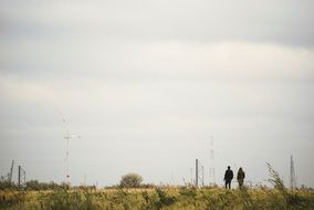 Picture of Walking People on a wheat field