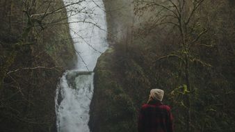 Landscape of Waterfall and girl