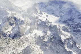 snow cover on the tops of the mountains