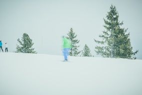 man in ski suit on a mountain area