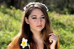 thoughtful woman with flower wreath