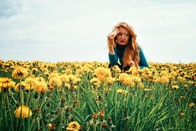 woman on the dandelion meadow