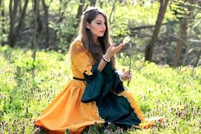 woman in princess dress in the spring forest