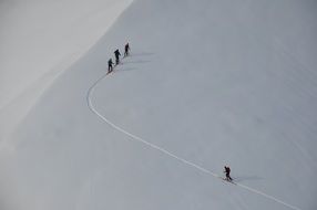 aerial view of skiers on a hillside
