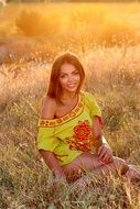 smiling beautiful girl in the sunset light