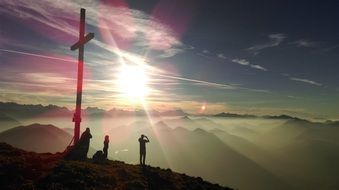 camaraderie at the peak of the mountain