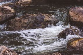 river among huge stones