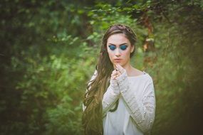 portrait of a woman in the summer forest