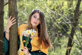 attractive Girl is in a forest in spring time