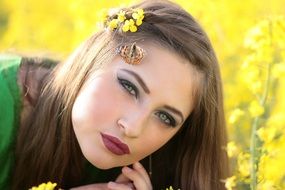 butterfly sitting on the woman's head