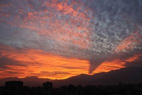 gorgeous Mountains Sunset with colorful clouds