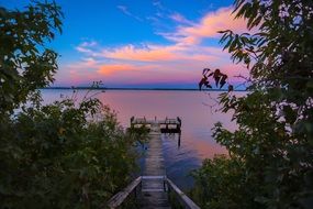 reflection of the pink sky in the lake