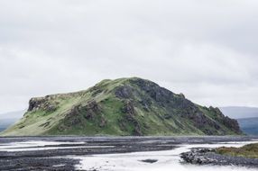 uninhabited rocky island in the fog