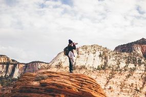 male Photographer on rock