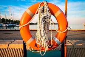 inflatable lifebuoy with rope on a ship