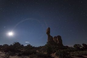 Rock in a desert at night
