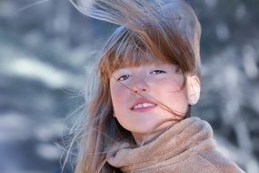 portrait of a young girl with developing hair