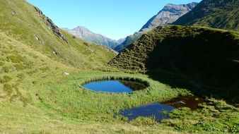circular lake in the mountains of east tyrol