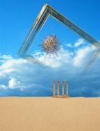 white clouds in the sky above a sandy beach