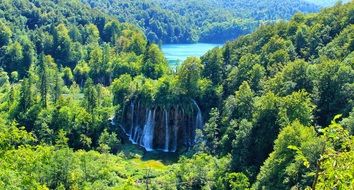 landscape of scenic waterfall and forest in Croatia