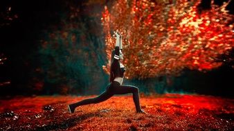 sports girl stands in a pose on a red background