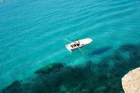 Fisherman Boat on turquoise water