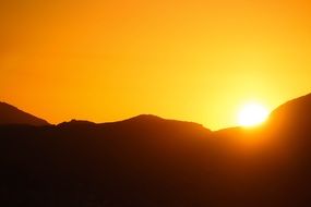 Landscape with orange sunset