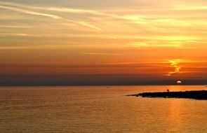 fisherman ashore during sunset
