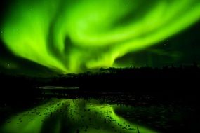 painted green northern lights on a dark background