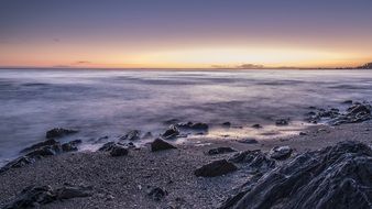 golden Sunset sky above purple seashore, spain, calahonda