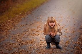 Photo of girl on haunches