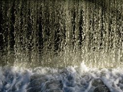 close-up foam spray of a waterfall