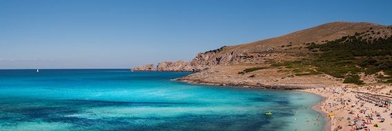 Beach on scenic coastline, Spain