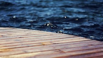 water near a wooden bridge