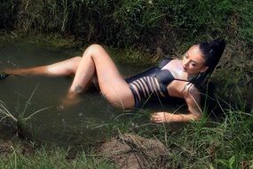 girl in a bathing suit in the water