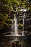 waterfall on the background of Gibson's cave