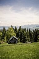 panoramic landscape of a mountain hut in the alps